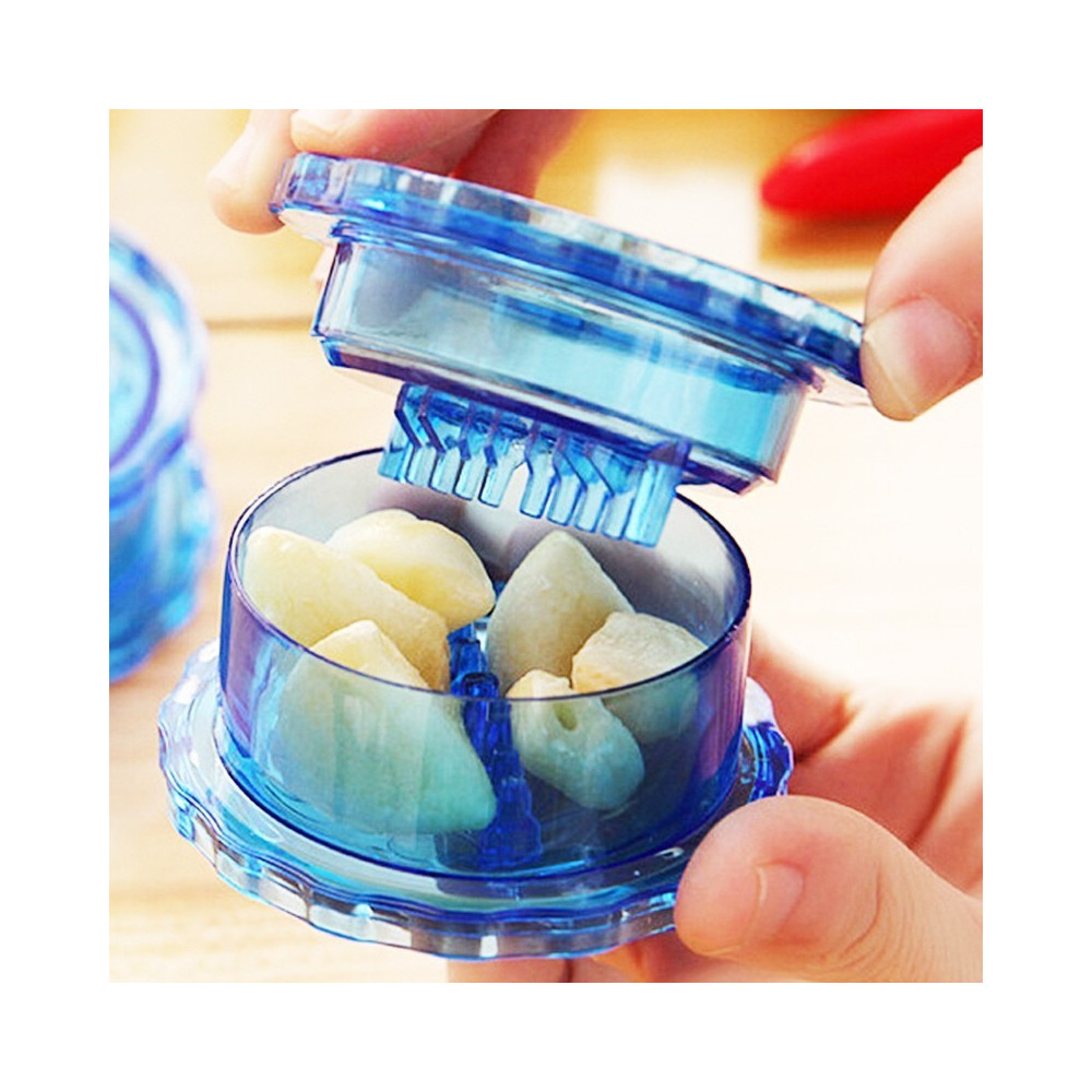 Garlic Twist многофункционална изстисквачка /трошачка за чесън.